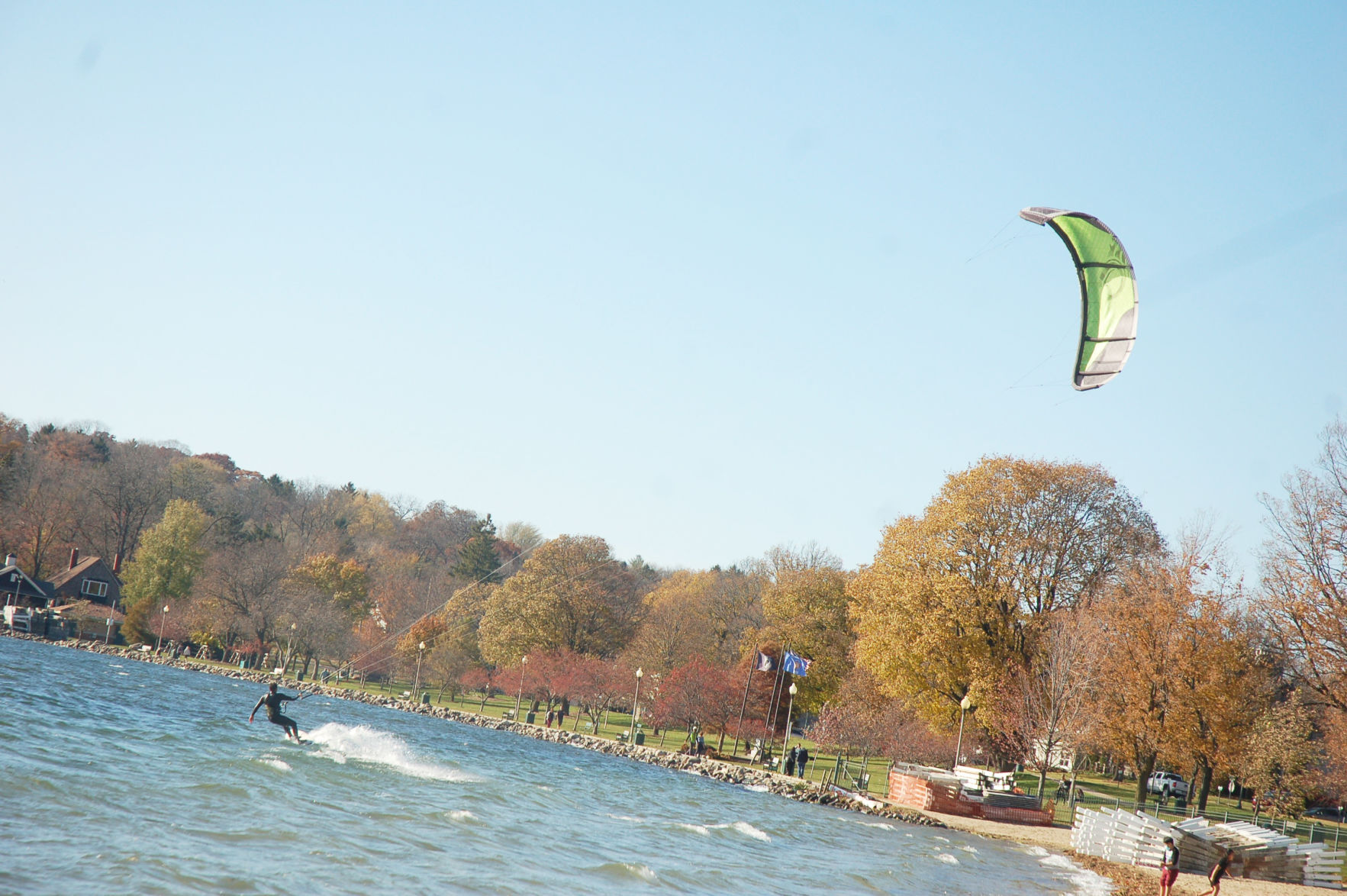 Harry Melges kiteboarding near the shore at Lake Geneva